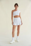 Avery Smoothing Flare Tennis Skort in White