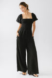 Piper Smocked Jumpsuit in Washed Black