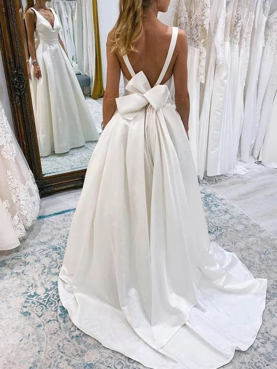 Ivory A Line Deep V Neck Long Wedding Dress with Bowknot
