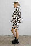 Tasha Cow Print Mini Skirt