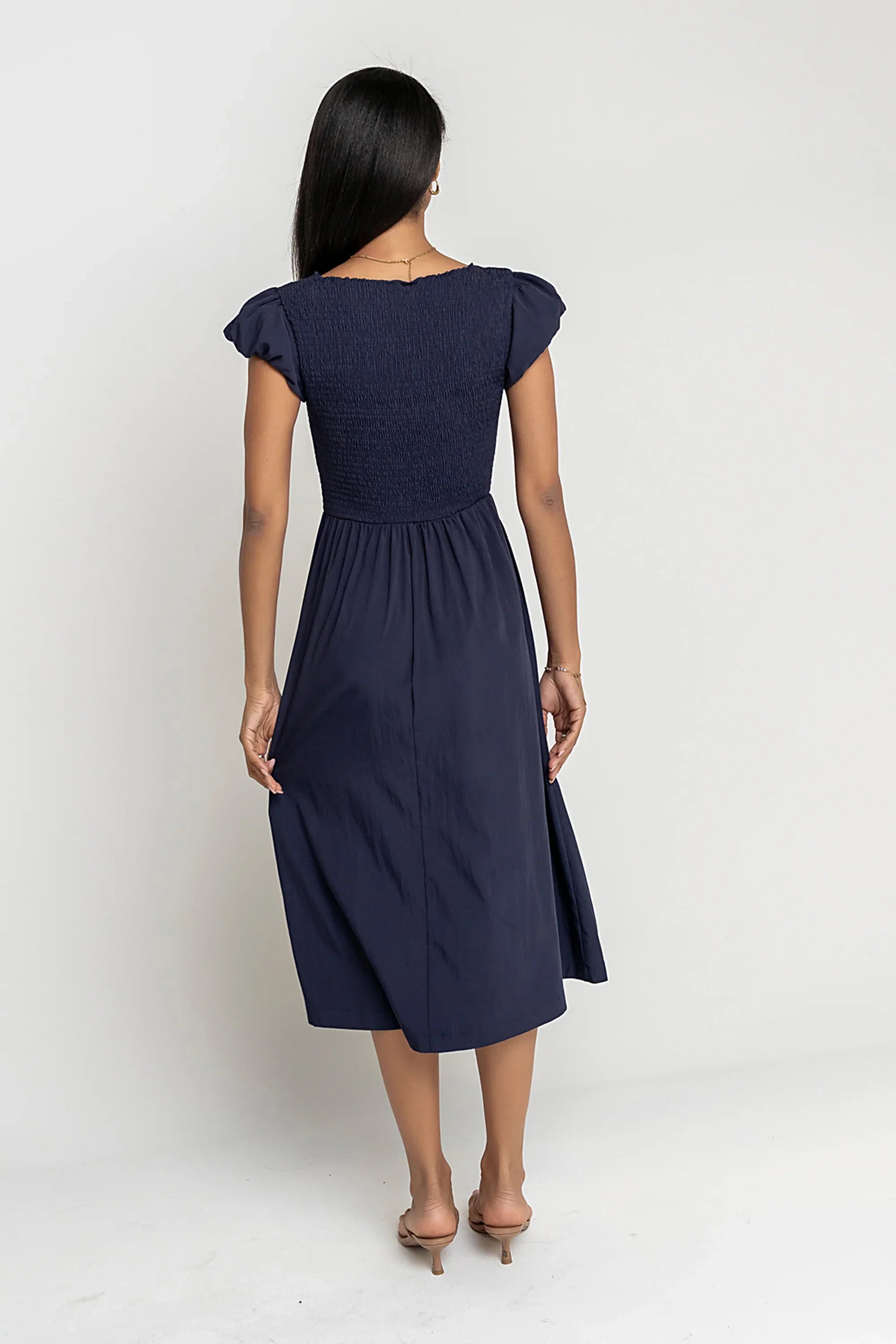 Harshell Smocked Midi Dress