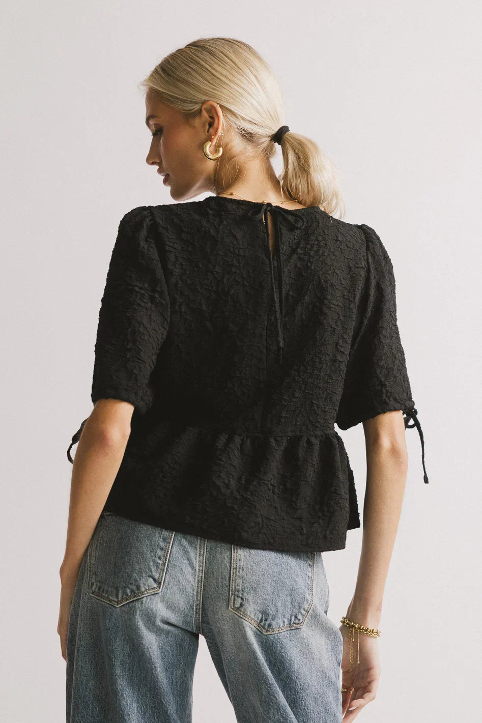 Alessia Peplum Top in Black