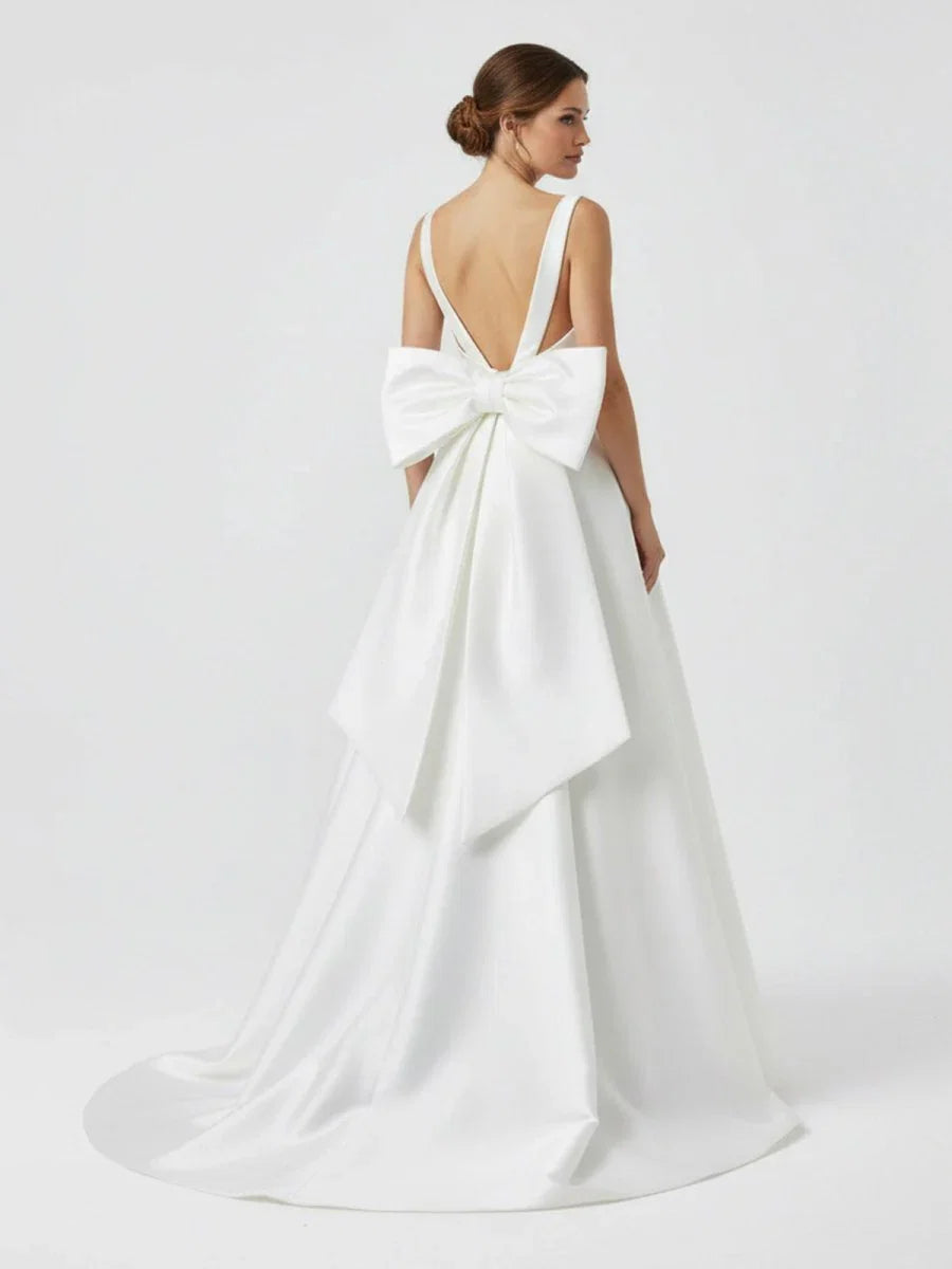 Ivory A Line Deep V Neck Long Wedding Dress with Bowknot