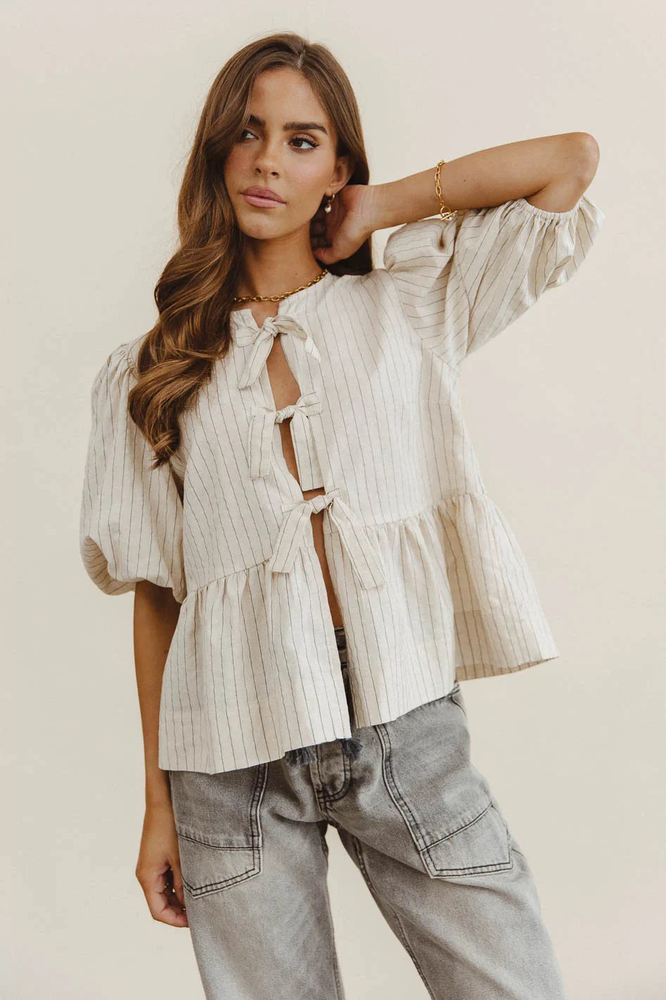 Corey Peplum Top in Tan