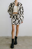 Tasha Cow Print Mini Skirt