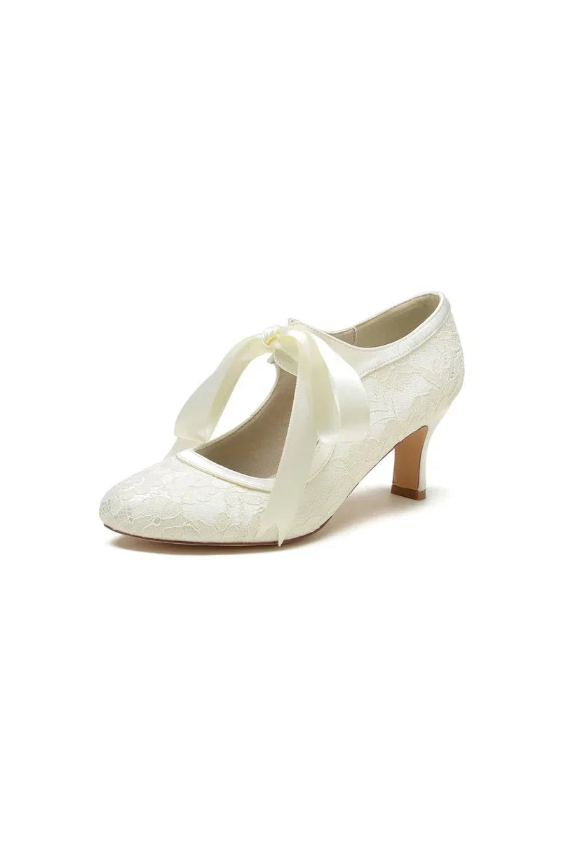 Ivory Lace High Heels Featuring a Classic Bow Design
