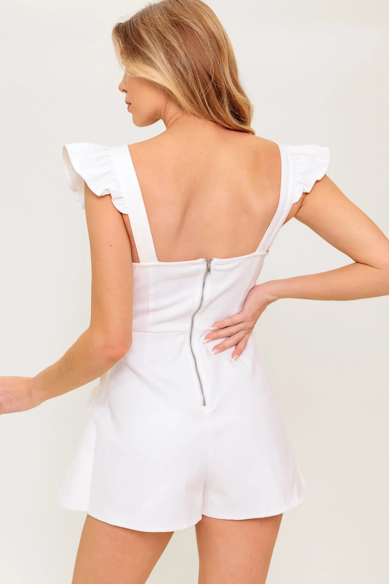 EXPLORING NEW CITIES WHITE DENIM RUFFLE SKORT ROMPER