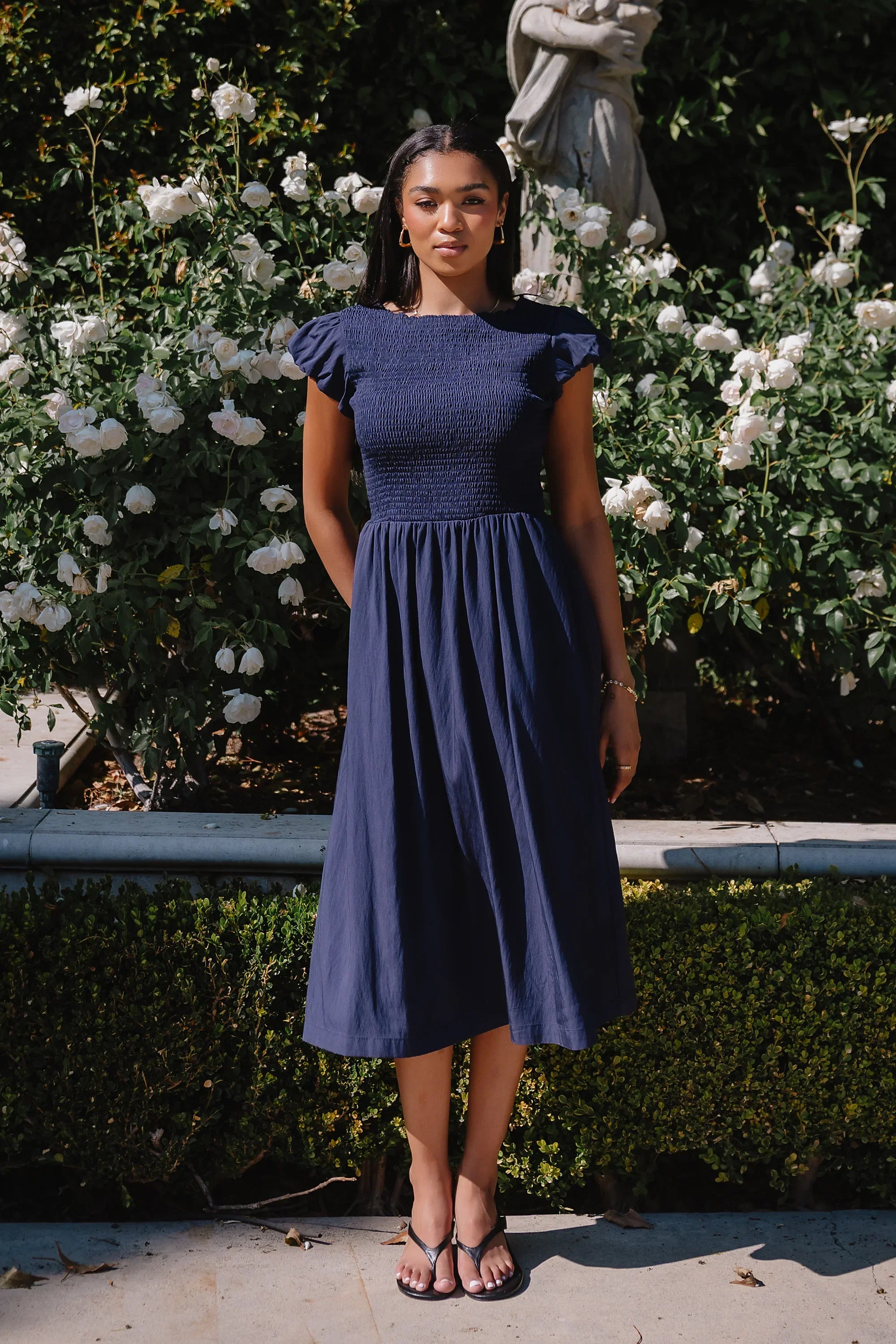 Harshell Smocked Midi Dress