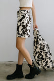 Tasha Cow Print Mini Skirt