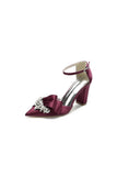 White Satin Heels Featuring a Large Decorative Bow and Metallic Heel