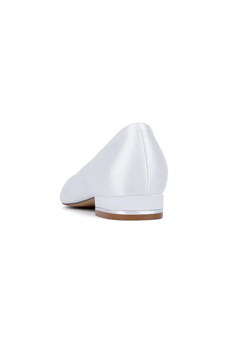 Ivory Flat Shoes with a Sleek Design