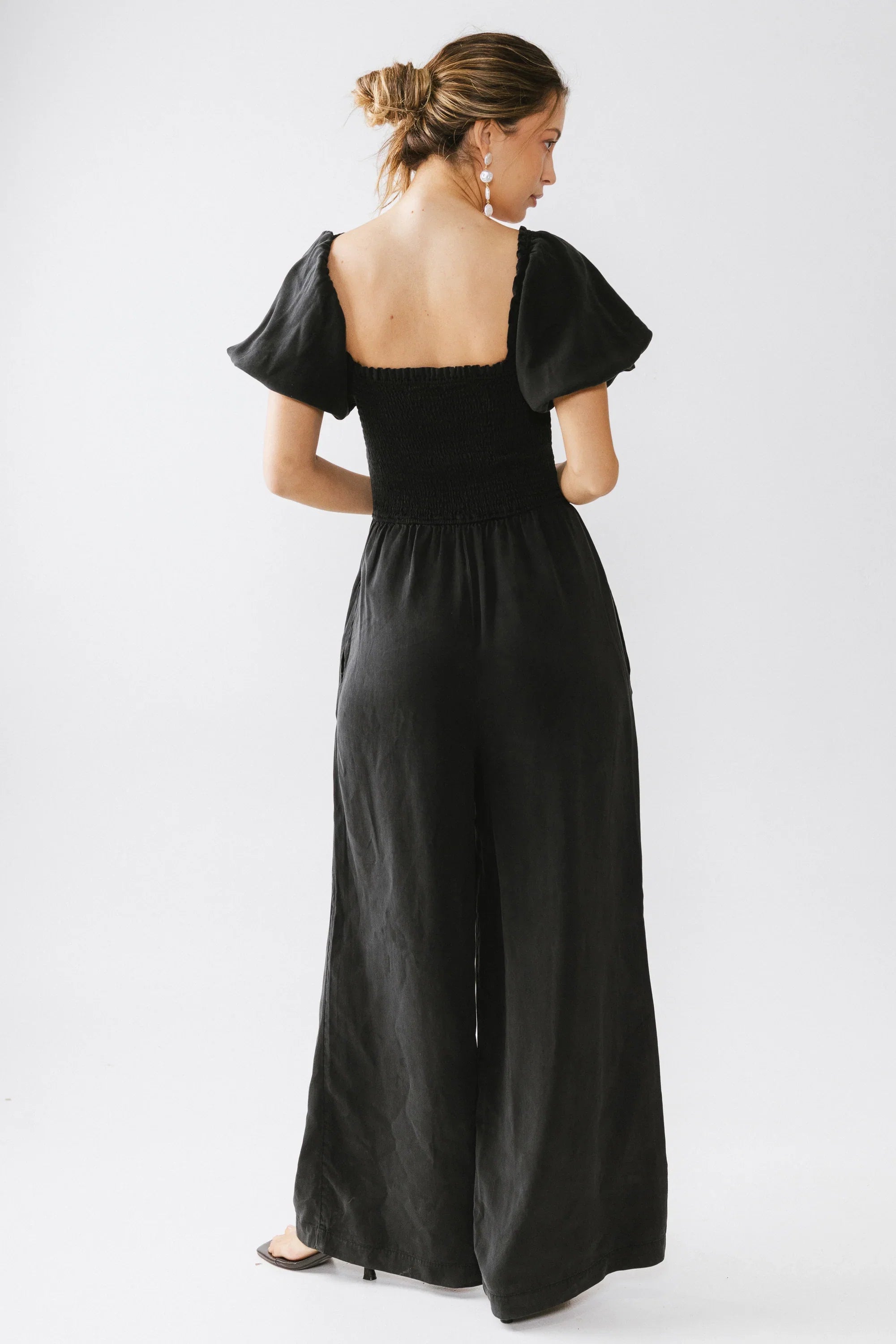 Piper Smocked Jumpsuit in Washed Black