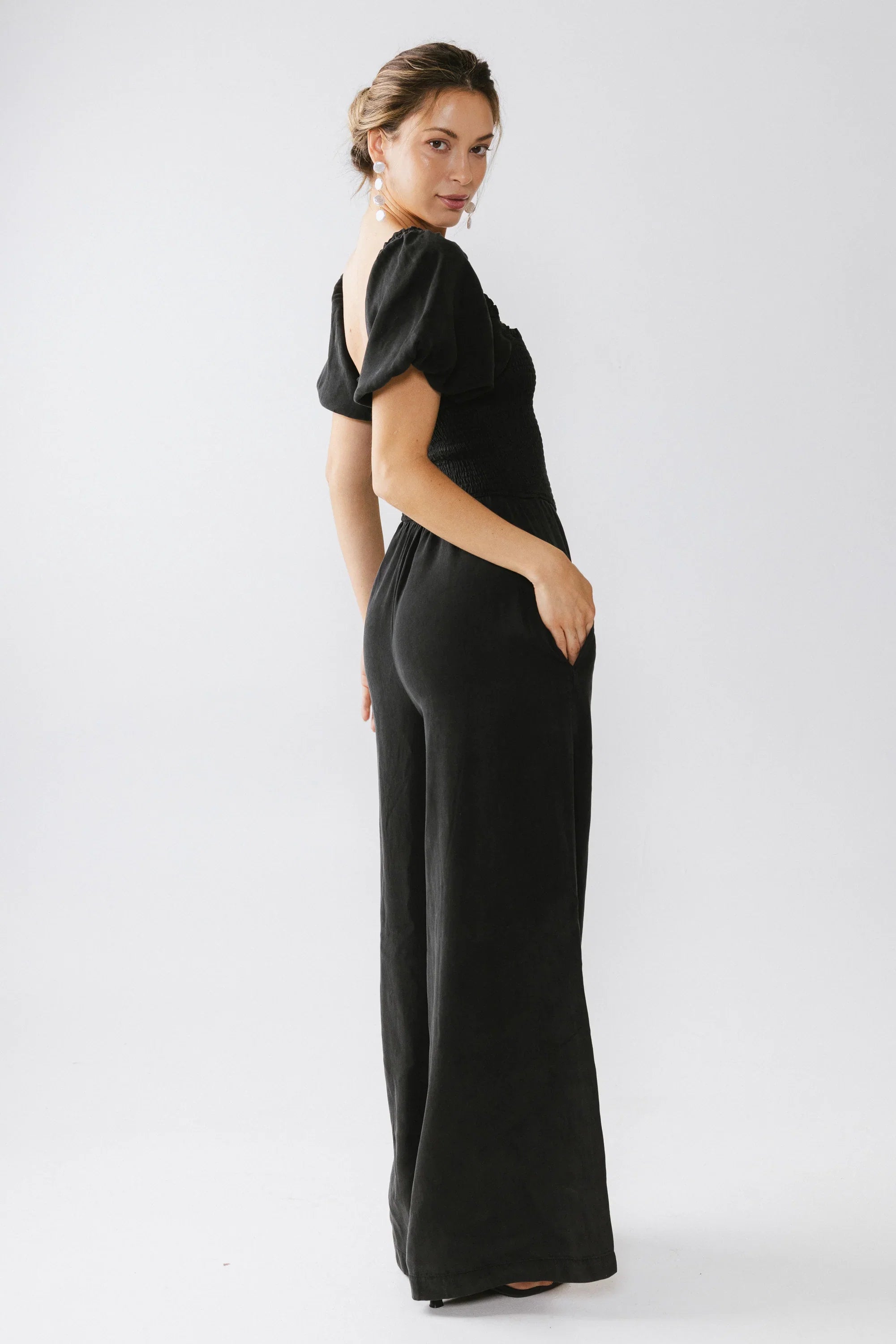 Piper Smocked Jumpsuit in Washed Black
