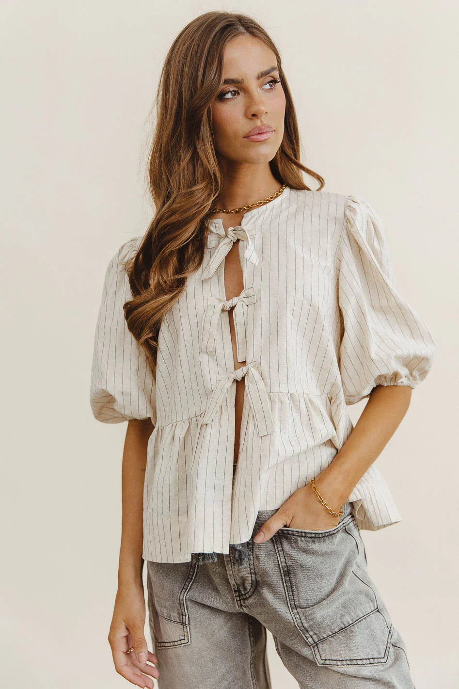 Corey Peplum Top in Tan